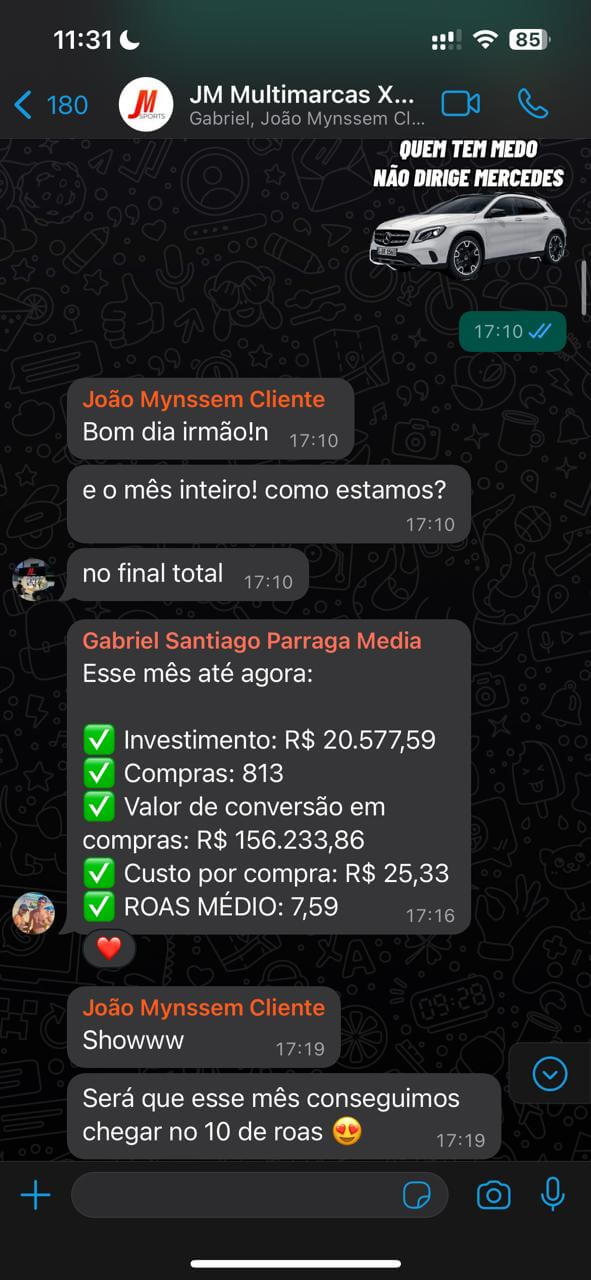 Relatório no grupo da JM Multimarcas: R$156.233,86 em vendas no mês, 813 compras, ROAS médio 7,59